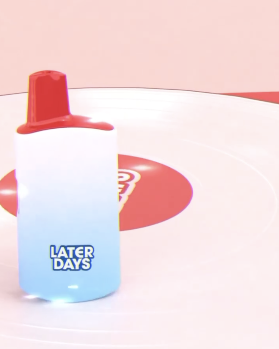 Later Days vape next to a red vinyl record on a turntable in NJ